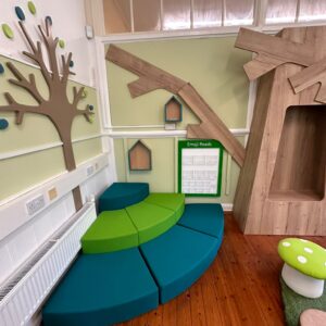 Corner tiered soft seating in children's library
