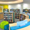 school library bookcases with signage