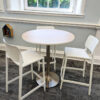 bar height table with bar stools for adults in library