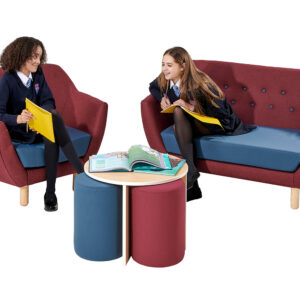 Students sitting library sofa and arm chair