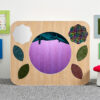 sensory den with purple light curtain and tactile elements