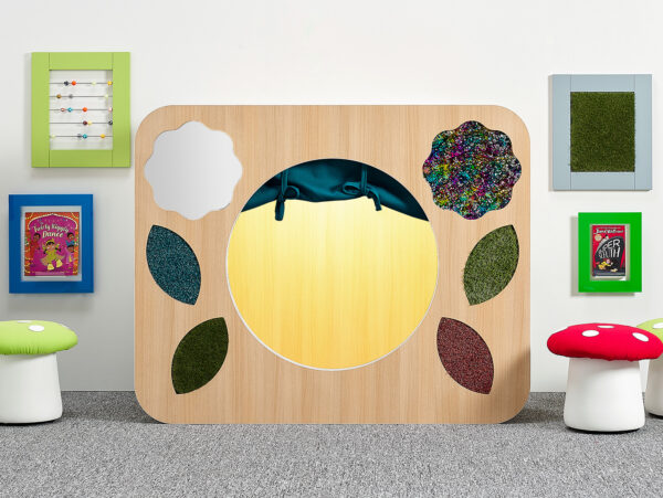 sensory den with yellow light curtain and tactile elements