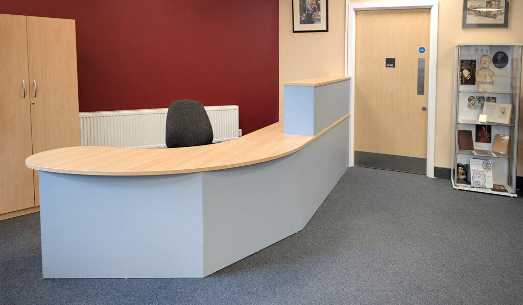 oak and blue librarian desk with chair