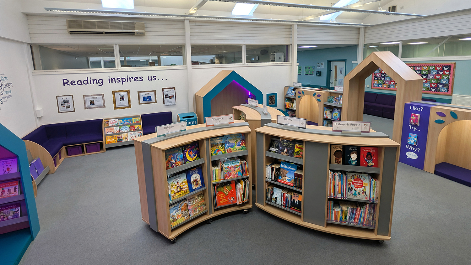 SEN school library with bookcases shelves seating and sensory elements